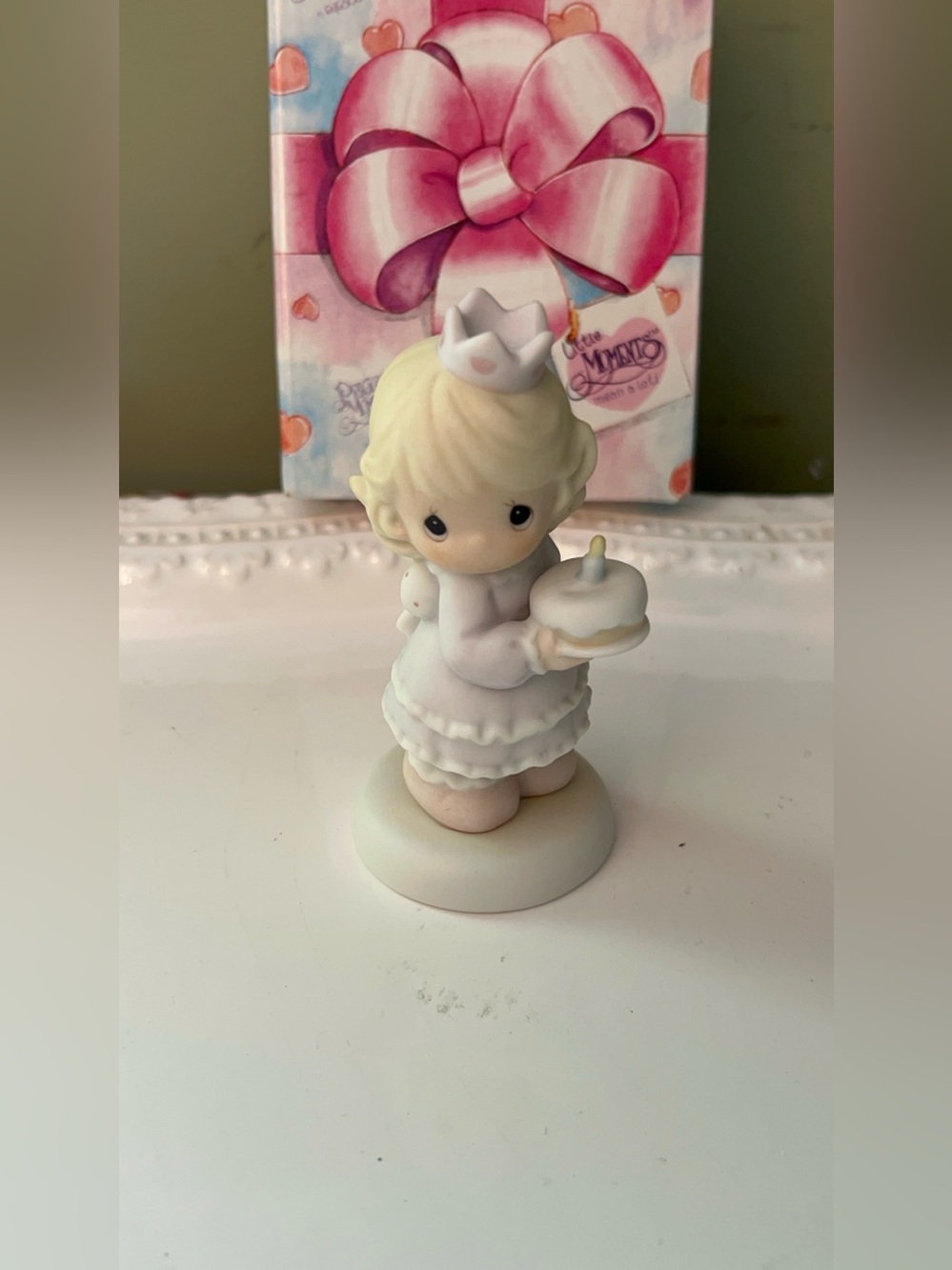 Precious Moments “Birthday Wishes with Hugs & Kisses” figurine (Item #139556)